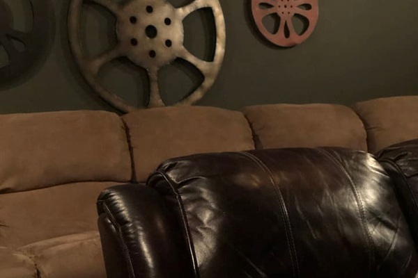 Enjoy a movie from our Home Theater complete with a brand new 65” smart tv, and leather/suede reclining sofas! New Soundbar and subwoofer just added for a full Theater experience. 