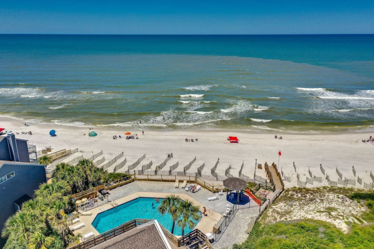 Step onto the boardwalk and let the beach remind you why you came &mdash; the sand is that close.