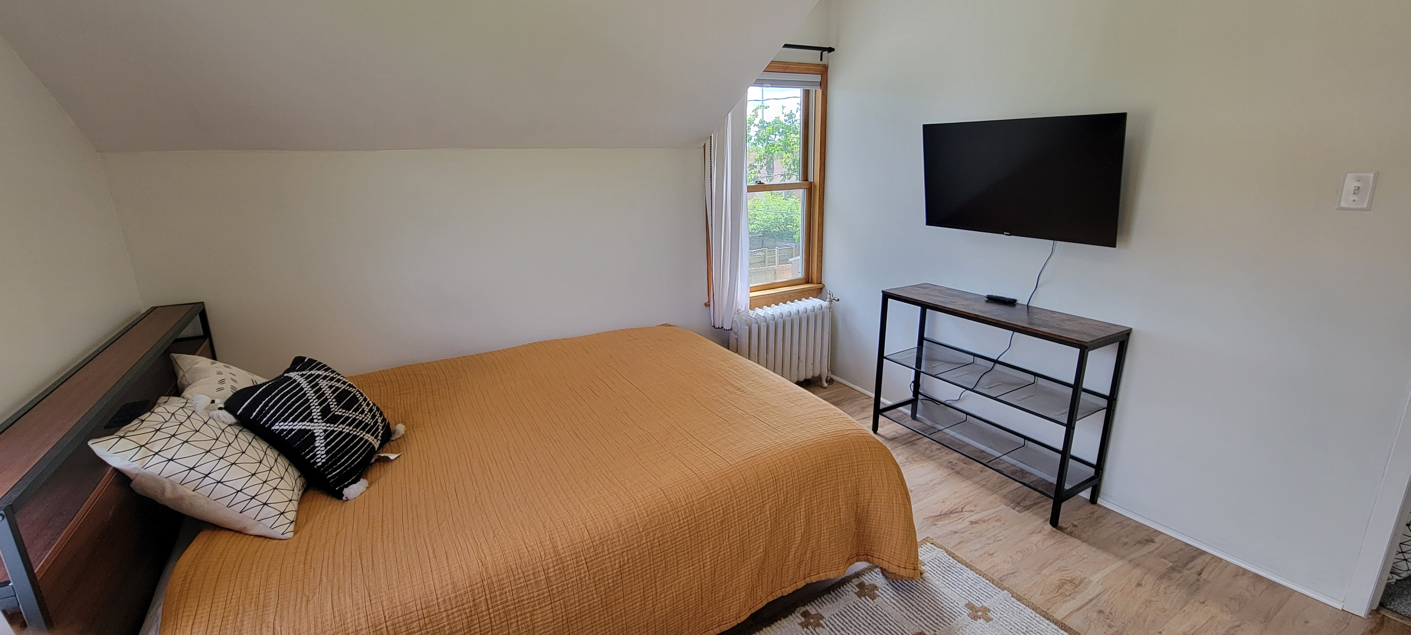 Second bedroom with TV — a cozy extra space to relax after a day in Duluth.