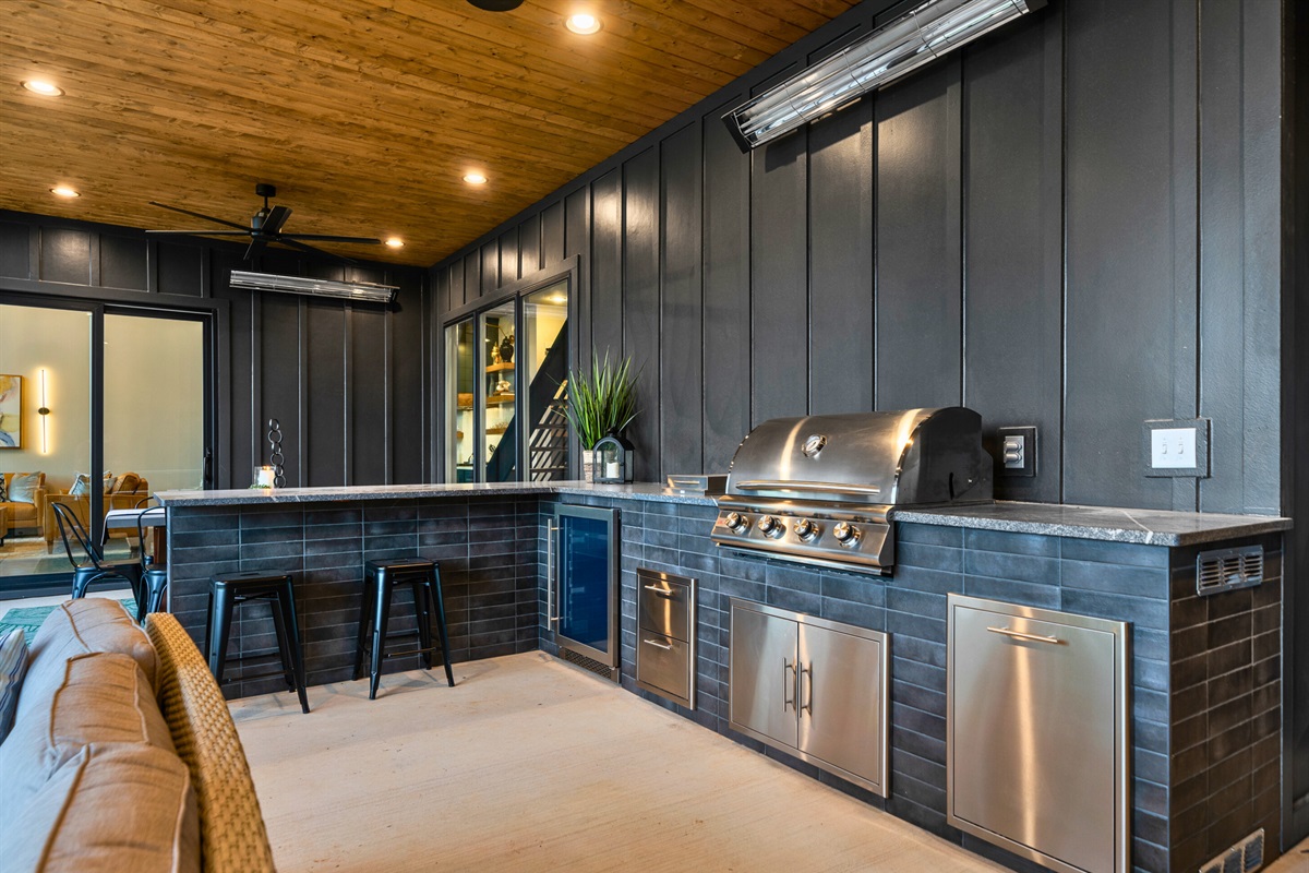 Enjoy the best of both worlds with our outdoor kitchen, combining modern appliances with the beauty of outdoor dining.
