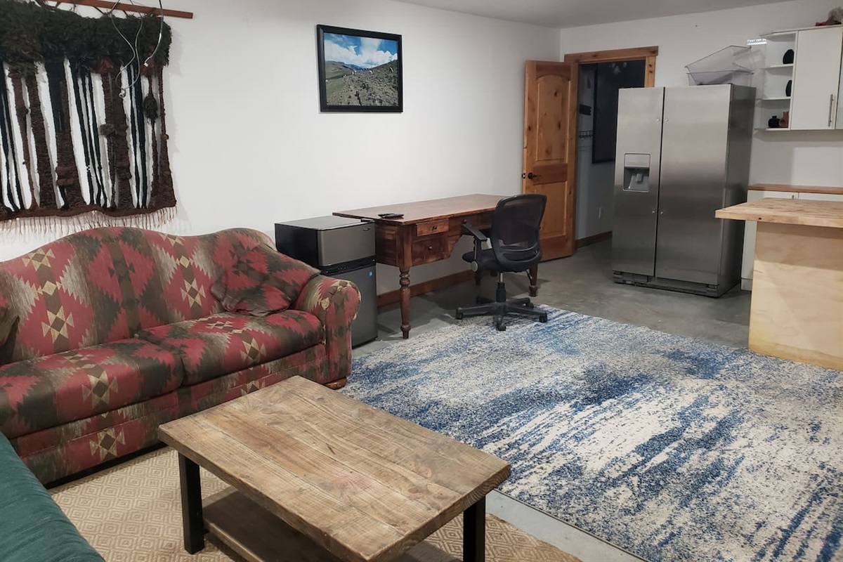 Basement bar/2nd living room/movie room with projector. 