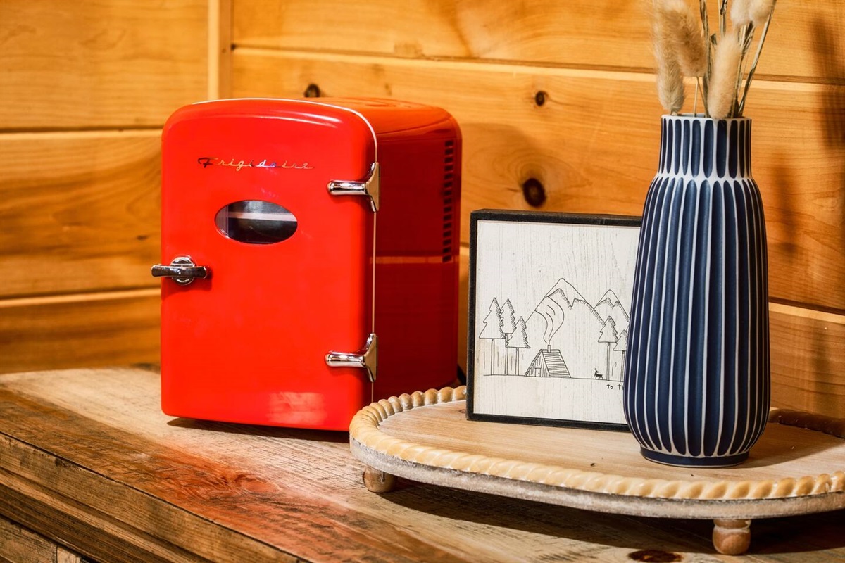 Mini fridge to cool drinks while you play some games.