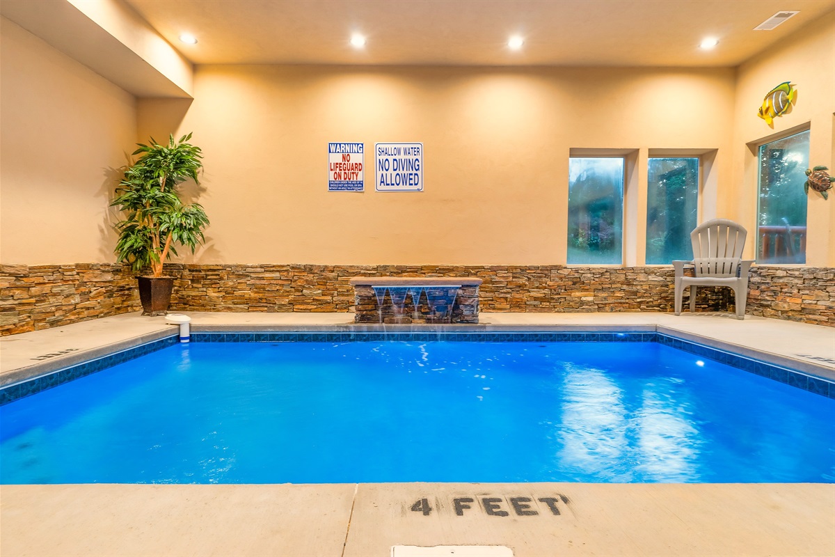 Indoor Pool with waterfall and lights