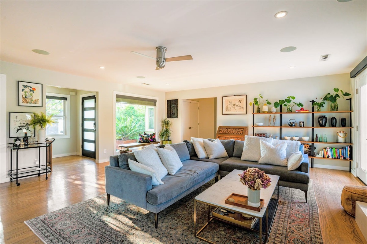 Living area with smart tv and fireplace.