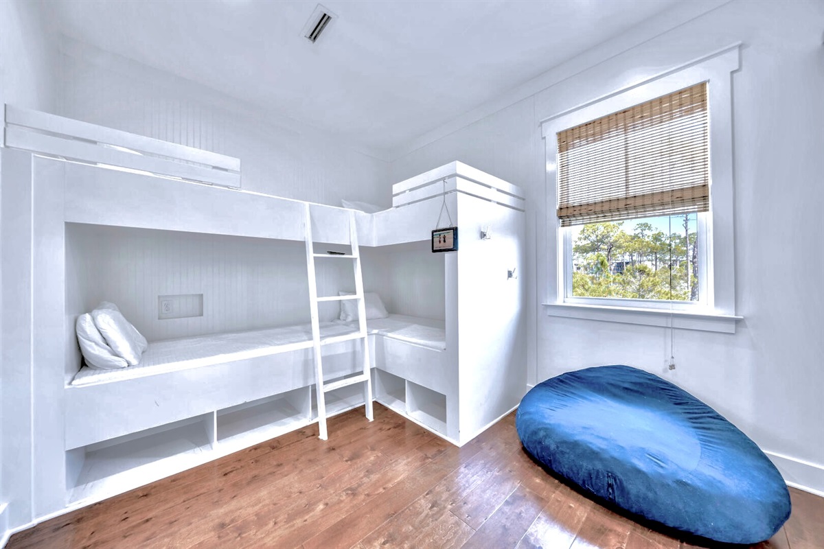 Upstairs bunk room with walk-in closet and ensuite bathroom
