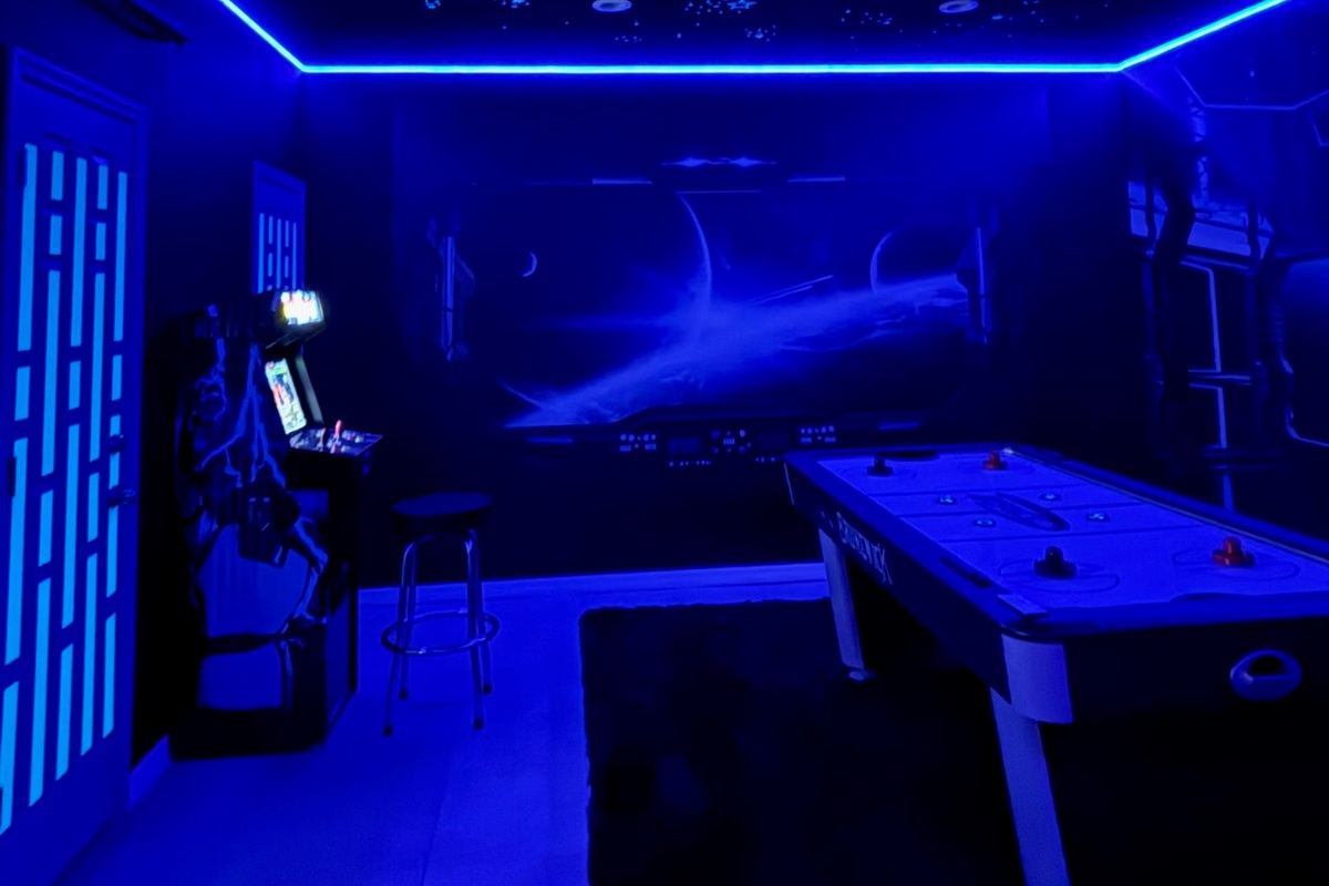 Air hockey, arcade machines, and basketball game — fun for the entire family.
