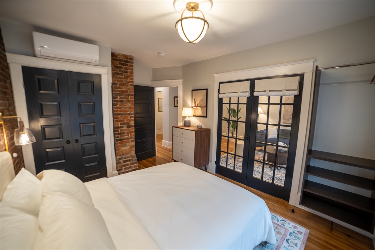 Spacious master bedroom with queen bed. 