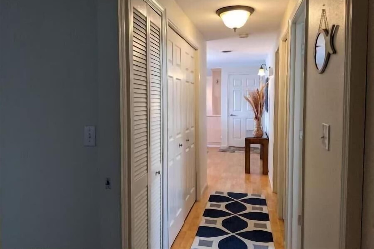 hallway with laundry closet