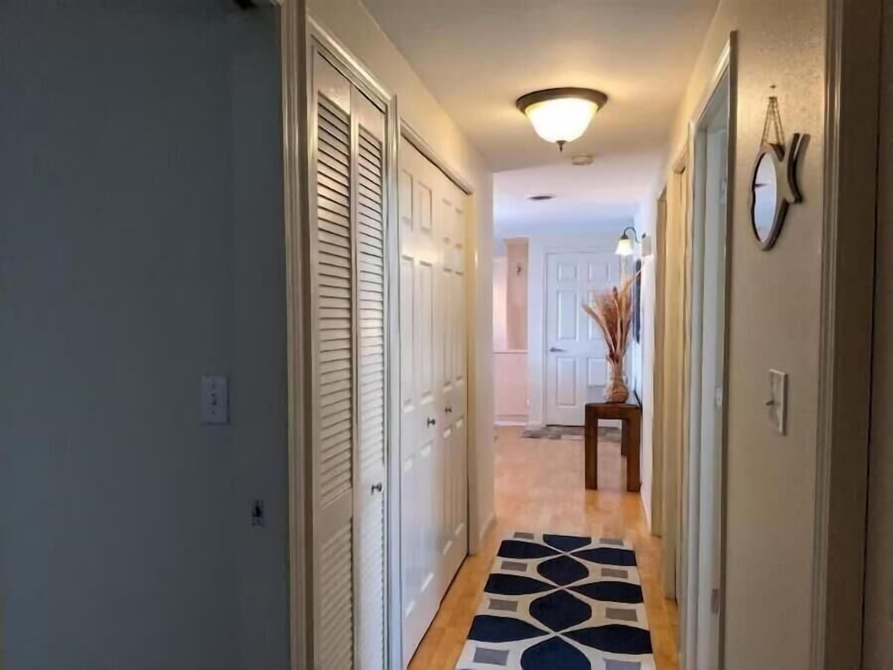 hallway with laundry closet