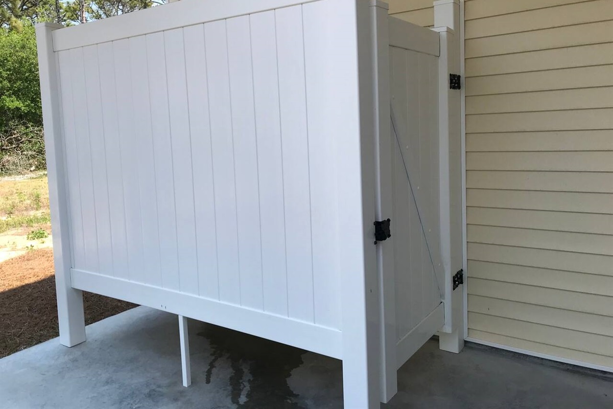 Wash the sand off your feet and get clean in this private, fully enclosed outdoor shower with hot & cold water. 