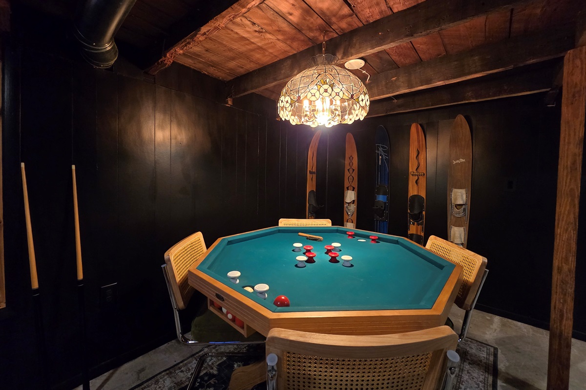 ♠️ Ultimate Game Night Setup: Gather around this stylish octagonal game table under a vintage-inspired chandelier. Whether it’s poker, bumper pool, or a round of cards, it's fun for all ages.