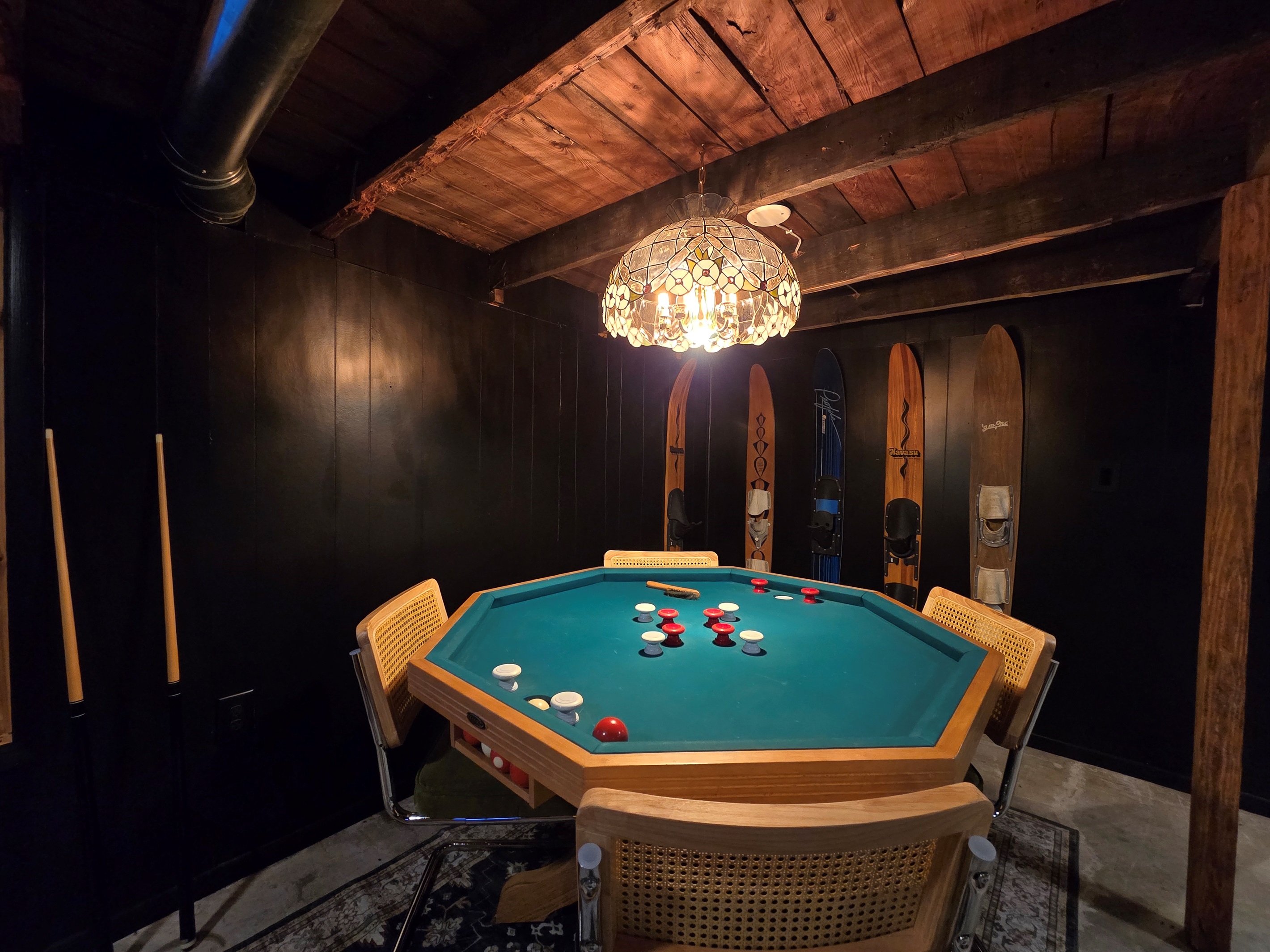 ♠️ Ultimate Game Night Setup: Gather around this stylish octagonal game table under a vintage-inspired chandelier. Whether it’s poker, bumper pool, or a round of cards, it's fun for all ages.