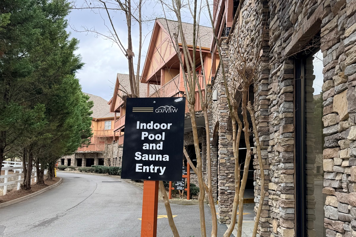 Sign leading to the indoor pool & sauna.  Community amenity