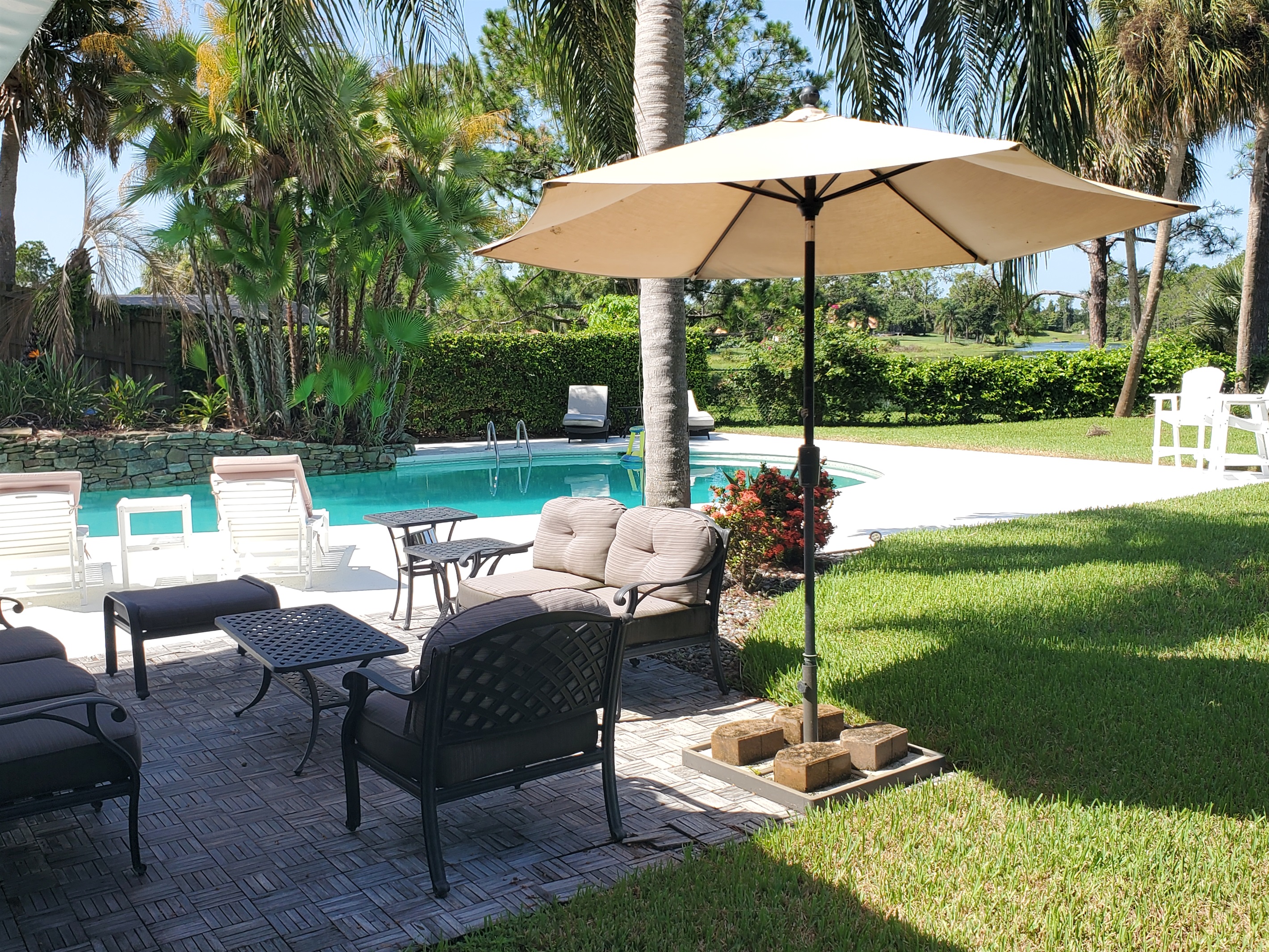 Outdoor patio and umbrella