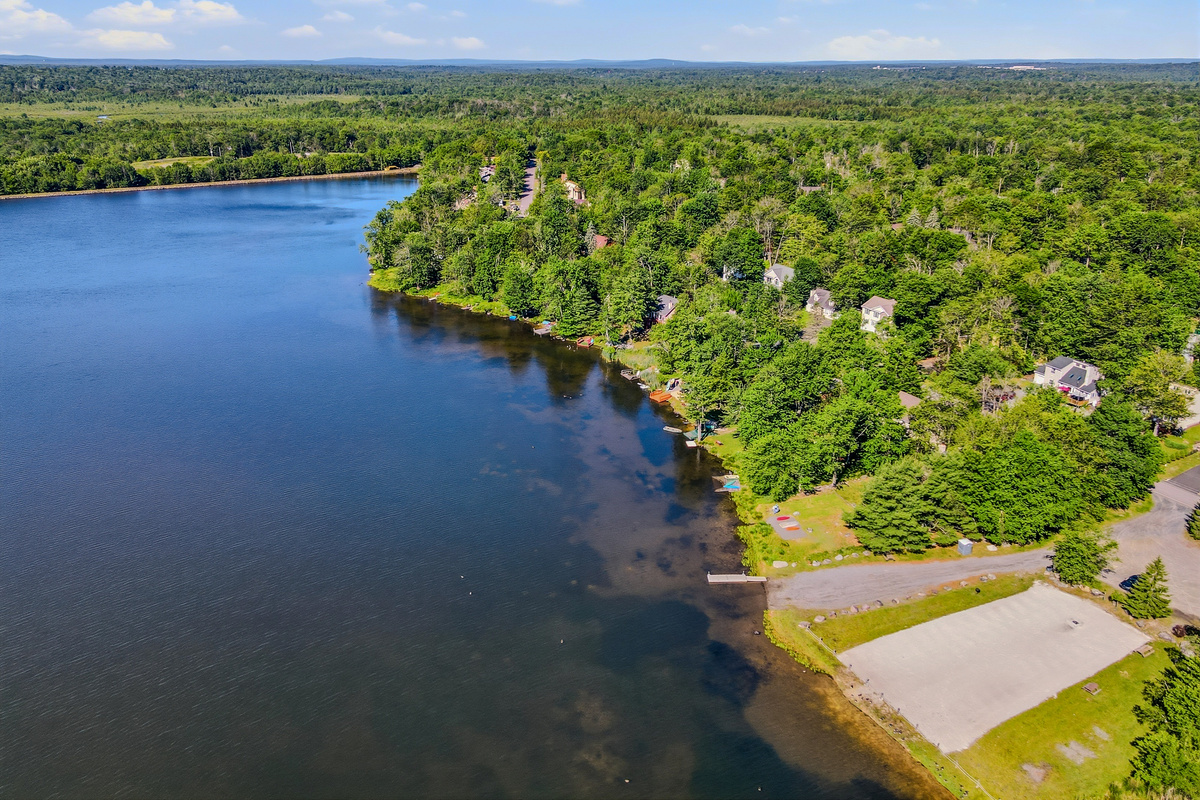 Aerial view of Lake Carobeth — the full lake expanse and wooded shoreline
