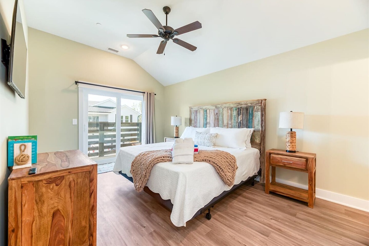 Relax in the bright and airy primary suite designed for restful nights.