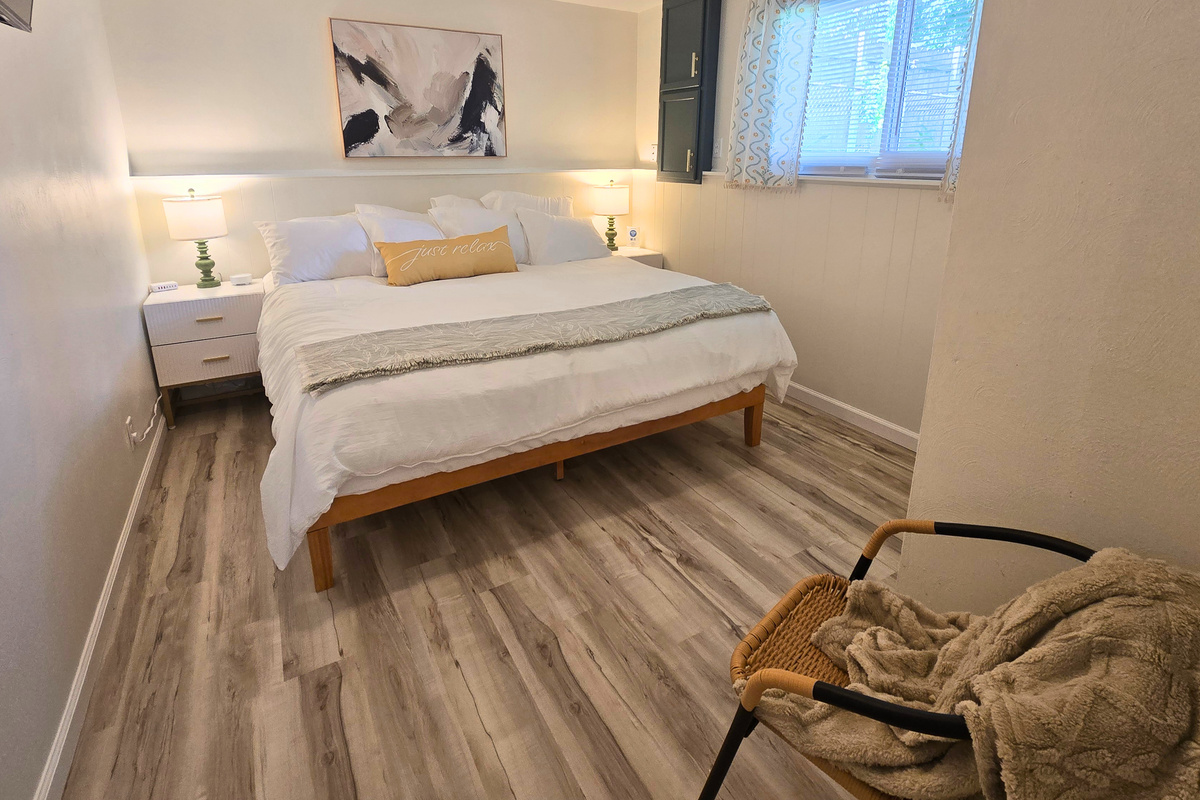 Thoughtful touches, cozy seating, and a plush king bed create a relaxing retreat.