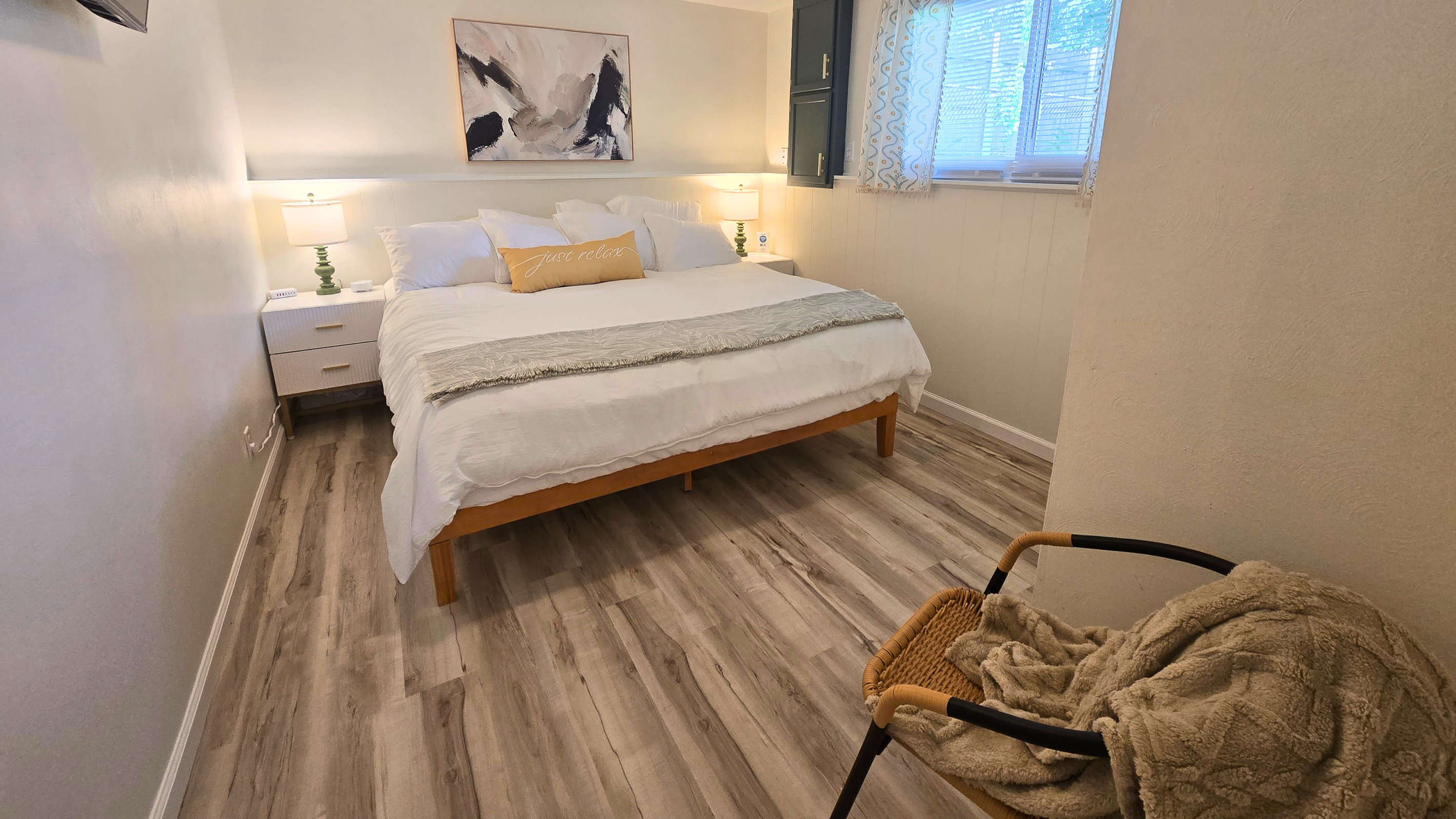 Thoughtful touches, cozy seating, and a plush king bed create a relaxing retreat.