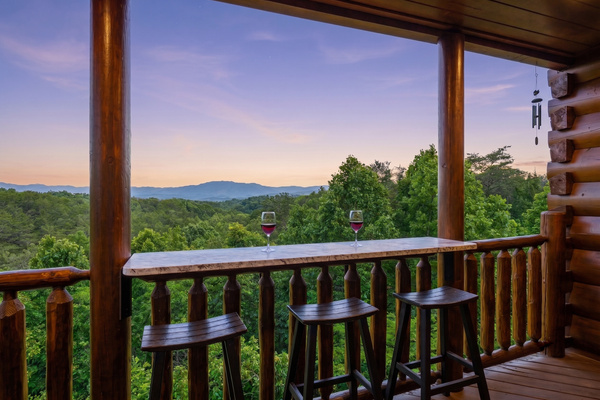 Settle down and take in the spectacular twilight views from our custom granite outdoor bar. The perfect spot to unwind after a day of adventures.