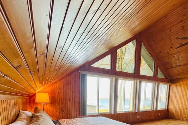 Warm wood ceiling and architectural cabin detail.