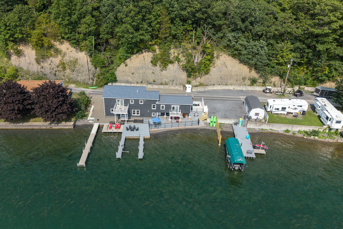 Aerial view of the lakefront property and docks