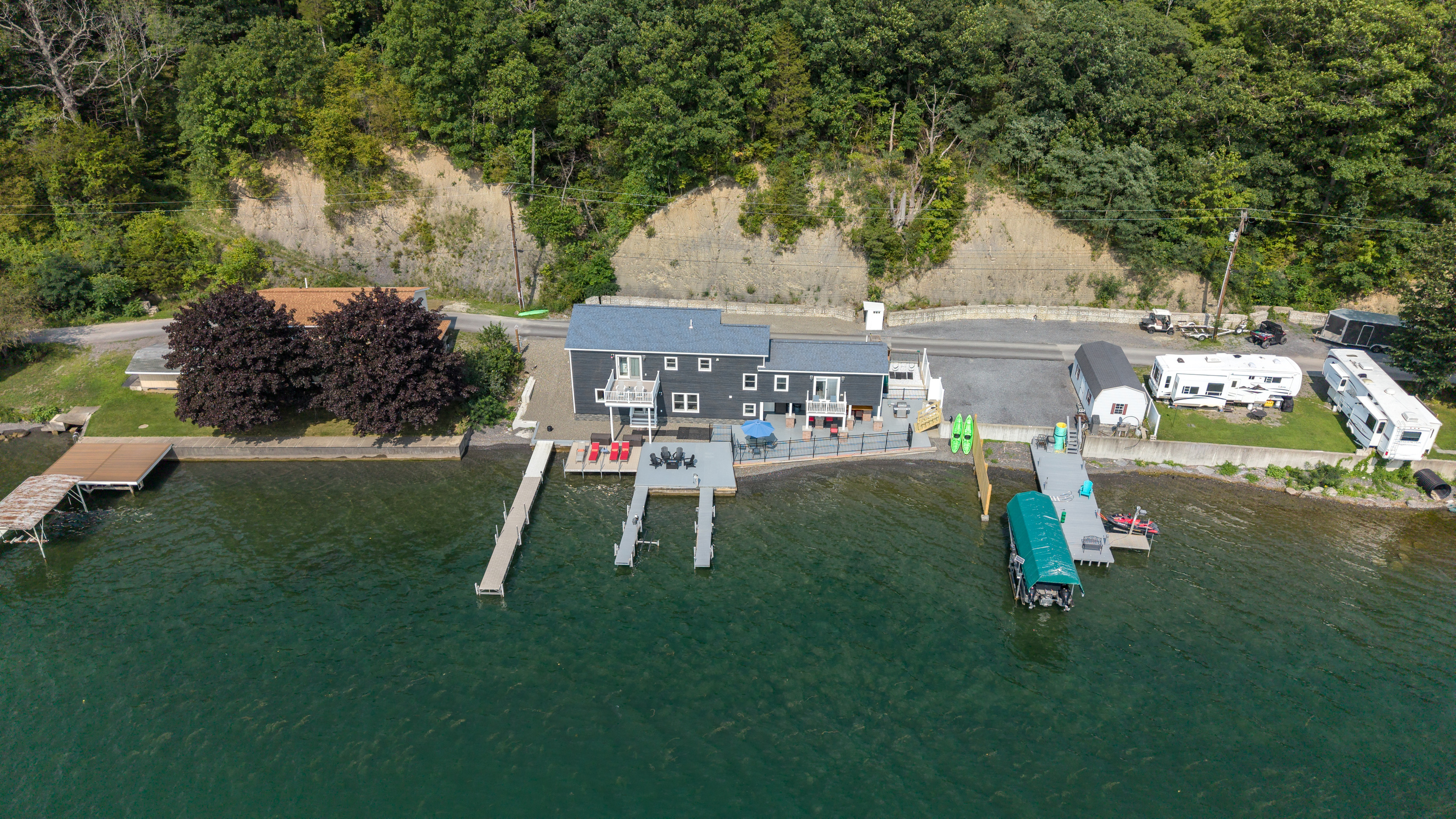 Aerial view of the lakefront property and docks