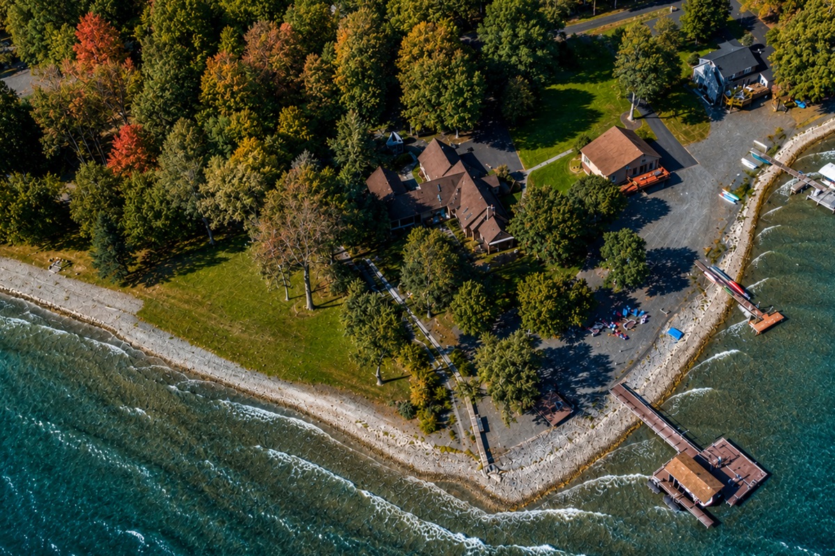 Expansive shoreline property with a private dock and unbeatable lake views. The ideal home base for boating, fishing, and relaxation.