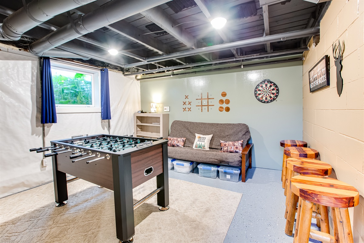 Bedroom 5 (the game room): full sized futon, wall mounted tic tac toe, darts, foosball table - great room for your teen!