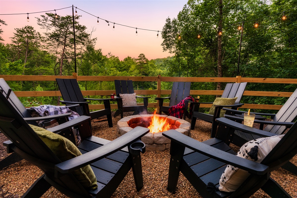 Backyard with fire pit and string lights