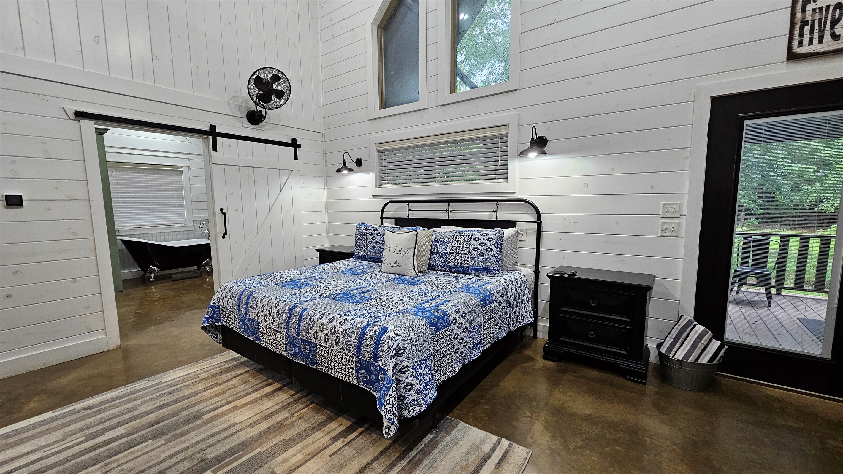 Charming Retreat: Relax in this stylish room with stunning stone accents and nature views!