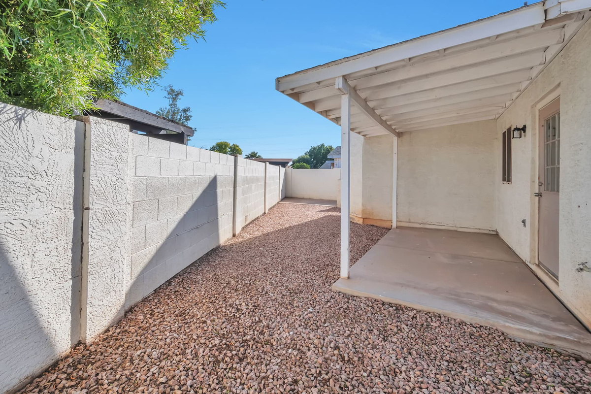 Arizona evenings were made for this — a covered back patio, shaded and private, made for sunset drinks