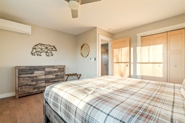 Comfortable second-level bedroom with a queen-size bed.