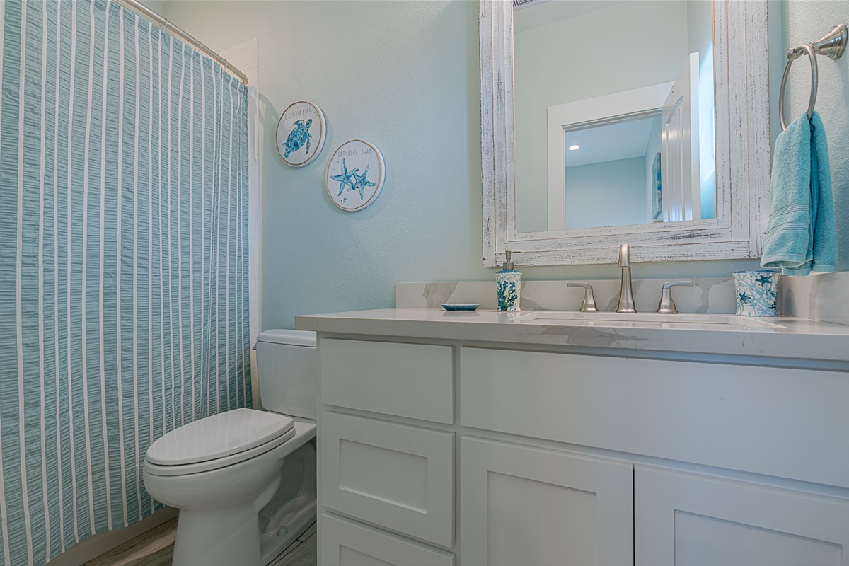 Full bathroom off of the main floor bedroom.