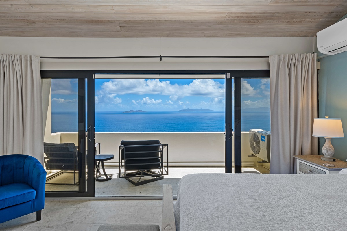 Primary bedroom with large balcony