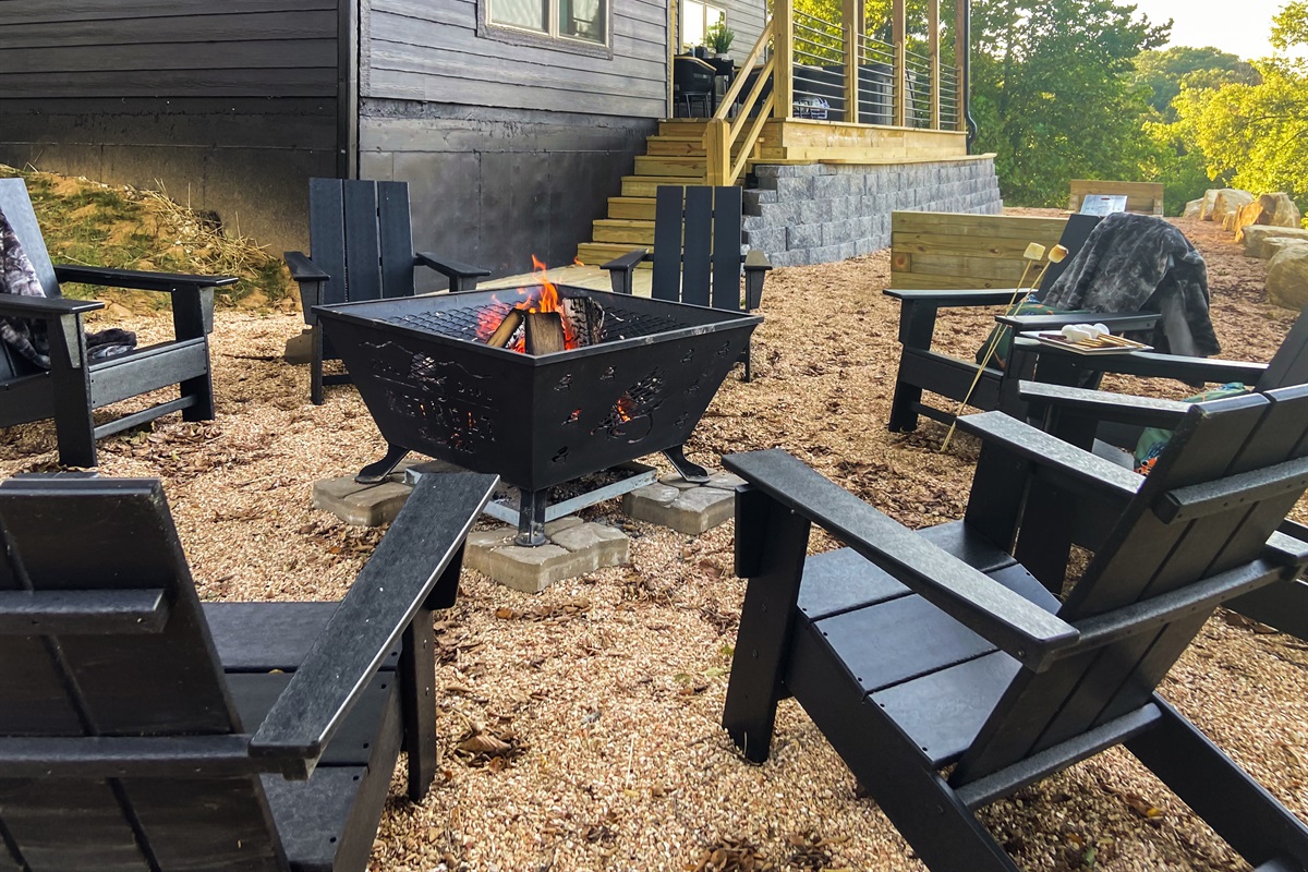 Lower deck stairs lead to the firepit and horseshoe area