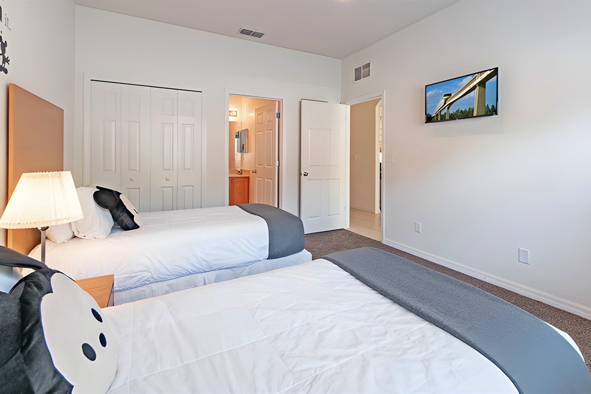 The twin bedroom has it's own smart TV and ensuite bathroom