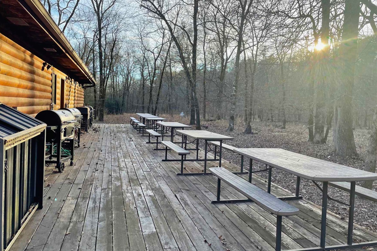 Community deck with picnic tables and grills for cookouts.