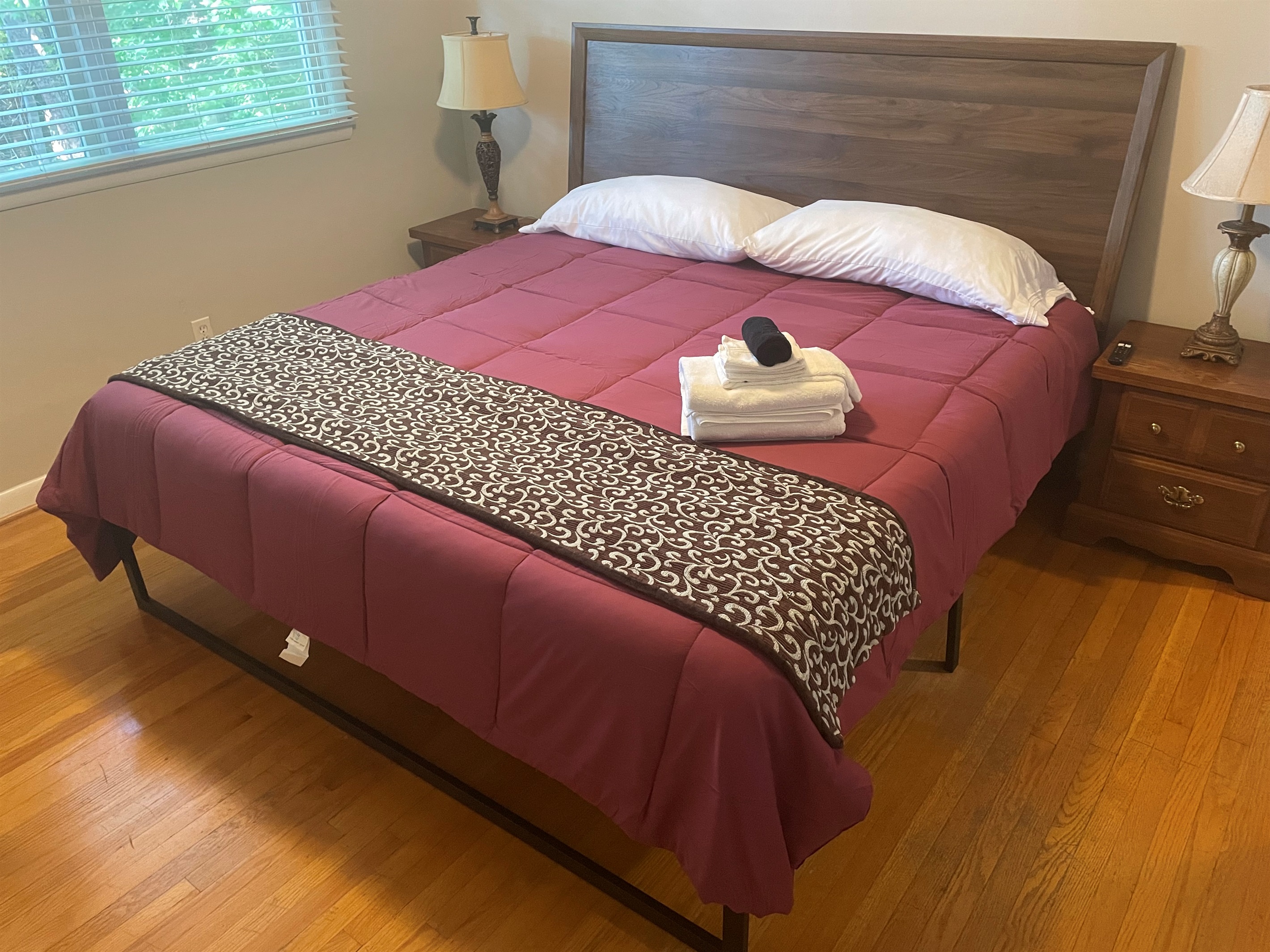 The third bedroom in the upper level has a comfortable king bed. It also has 2 closets, a smart TV, ceiling fan, and is about 2 steps away from a full bathroom.