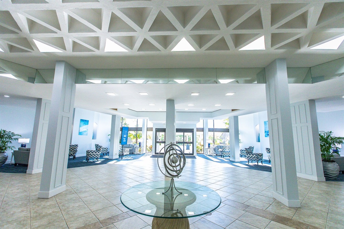 Elegant lobby with coastal architecture and welcome ambiance.