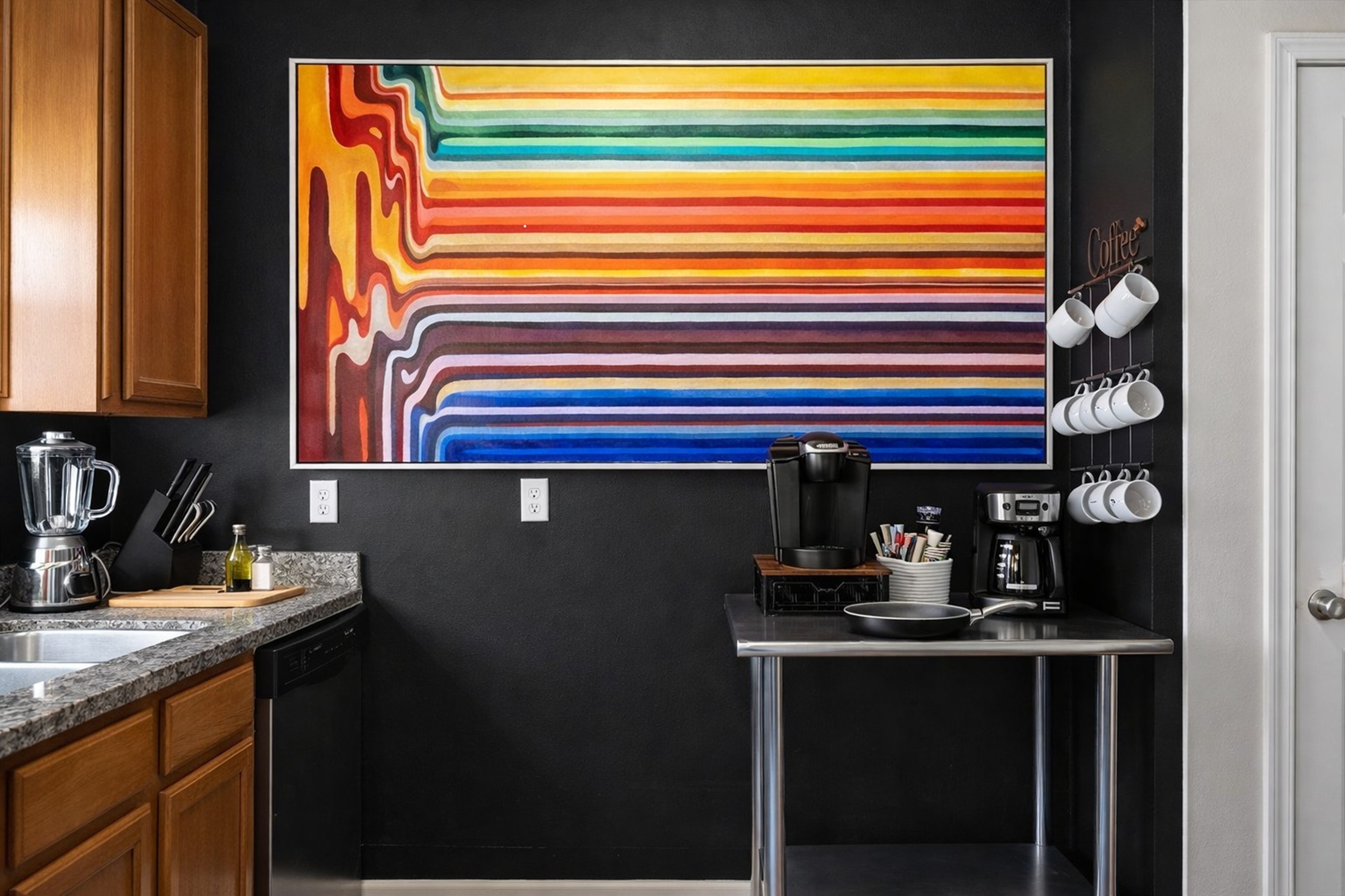 Fully equipped kitchen with stocked coffee station