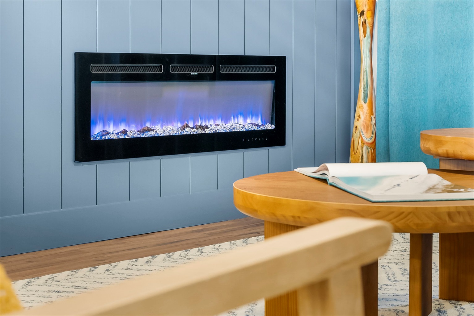 Feelin' relaxed, refreshed, and recharged beachside as you curl up to the fireplace after a long day in the sun (can be operated without heat for ambient flames).
