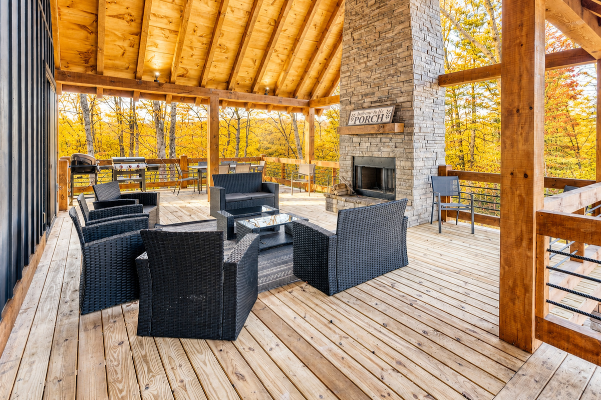 Expansive seating on our main level covered deck with mountain views
