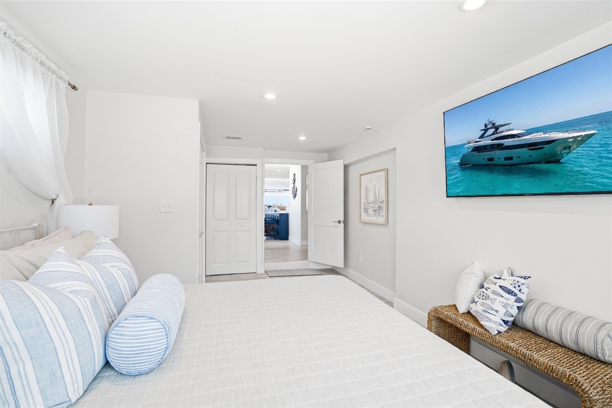 The Sailaway Room is designed for comfort features a king bed and smart TV. 