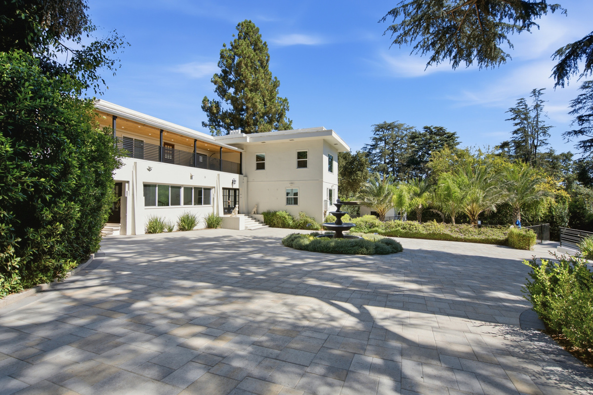 Exterior view highlighting the home’s charming architecture and surroundings.