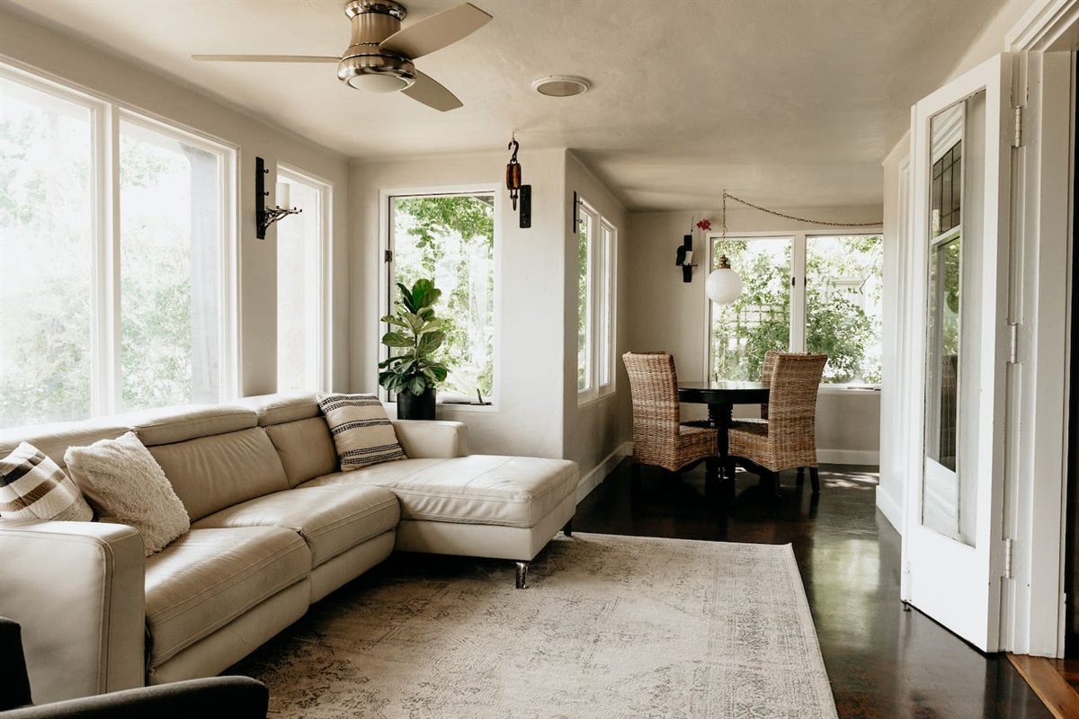 Everyone's favorite room in the house. The sunroom. In 1907 when the house was completed this was an outdoor patio. Now it is our bright and sunny (and air conditioned) sunroom. 