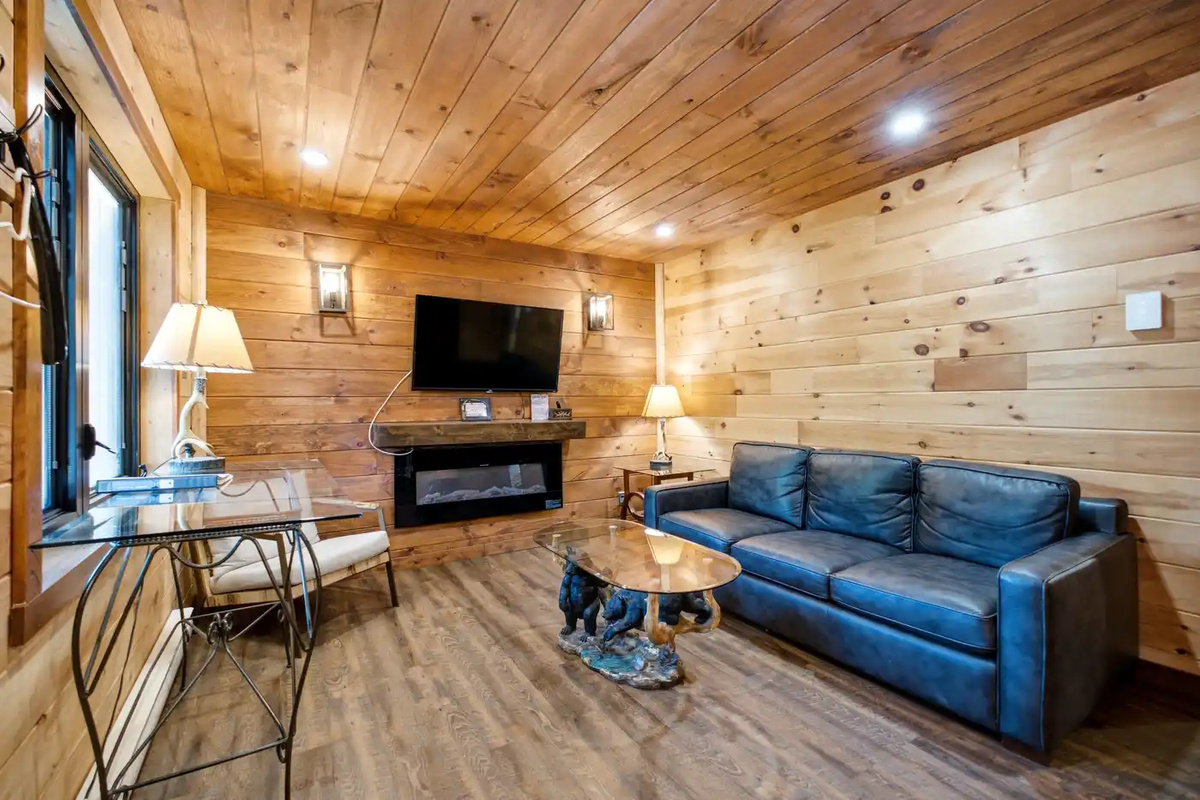 Bright living room with fireplace and comfortable seating
