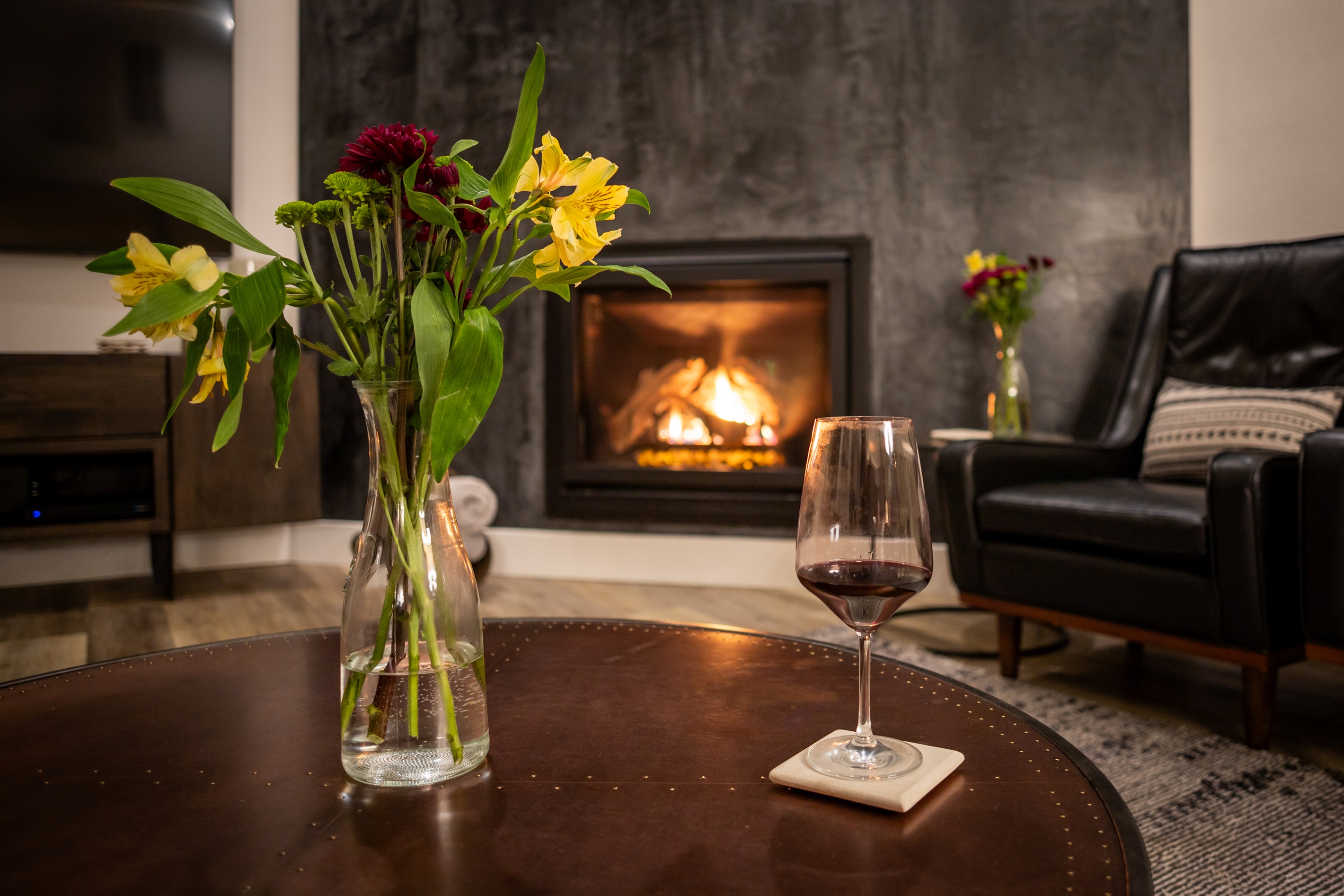 Fresh flowers, a glass of red, and a fire that never needs tending. This is what a night at the Hilltop Guest House feels like.