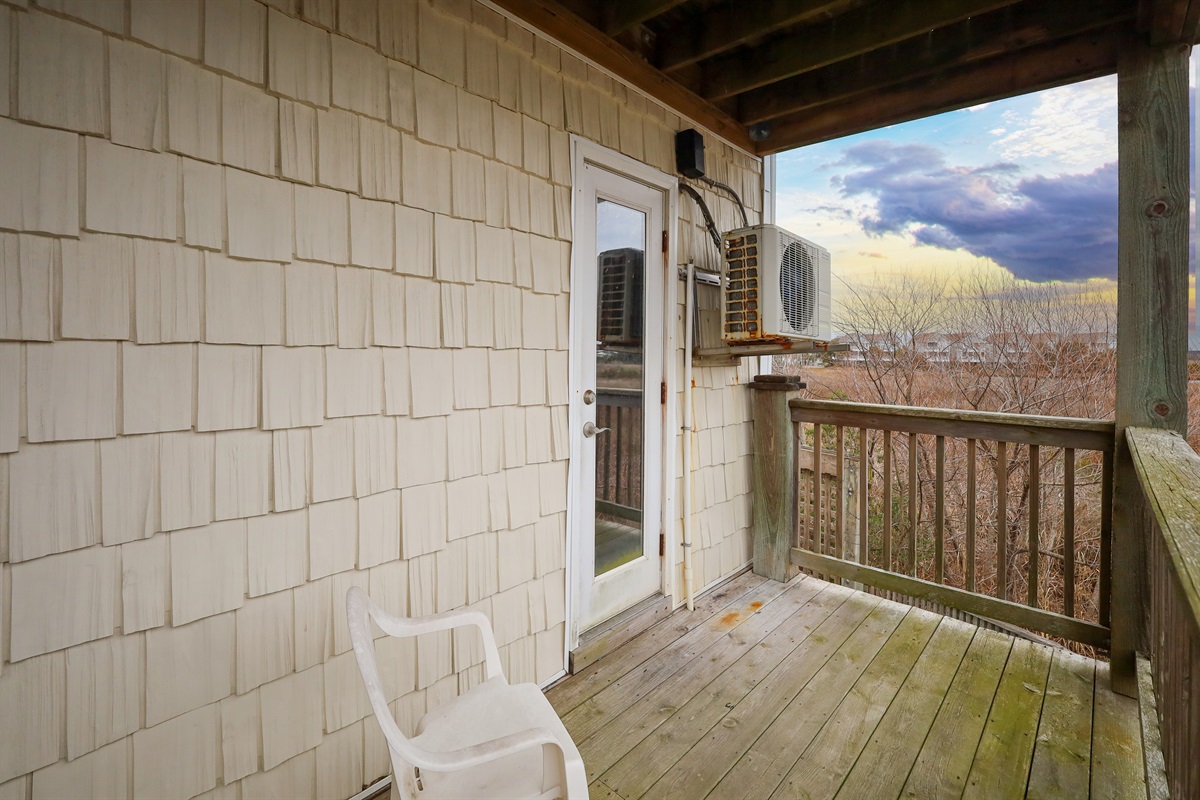 Covered balcony with peaceful Intracoastal Waterway views&mdash;perfect for morning coffee or sunset skies