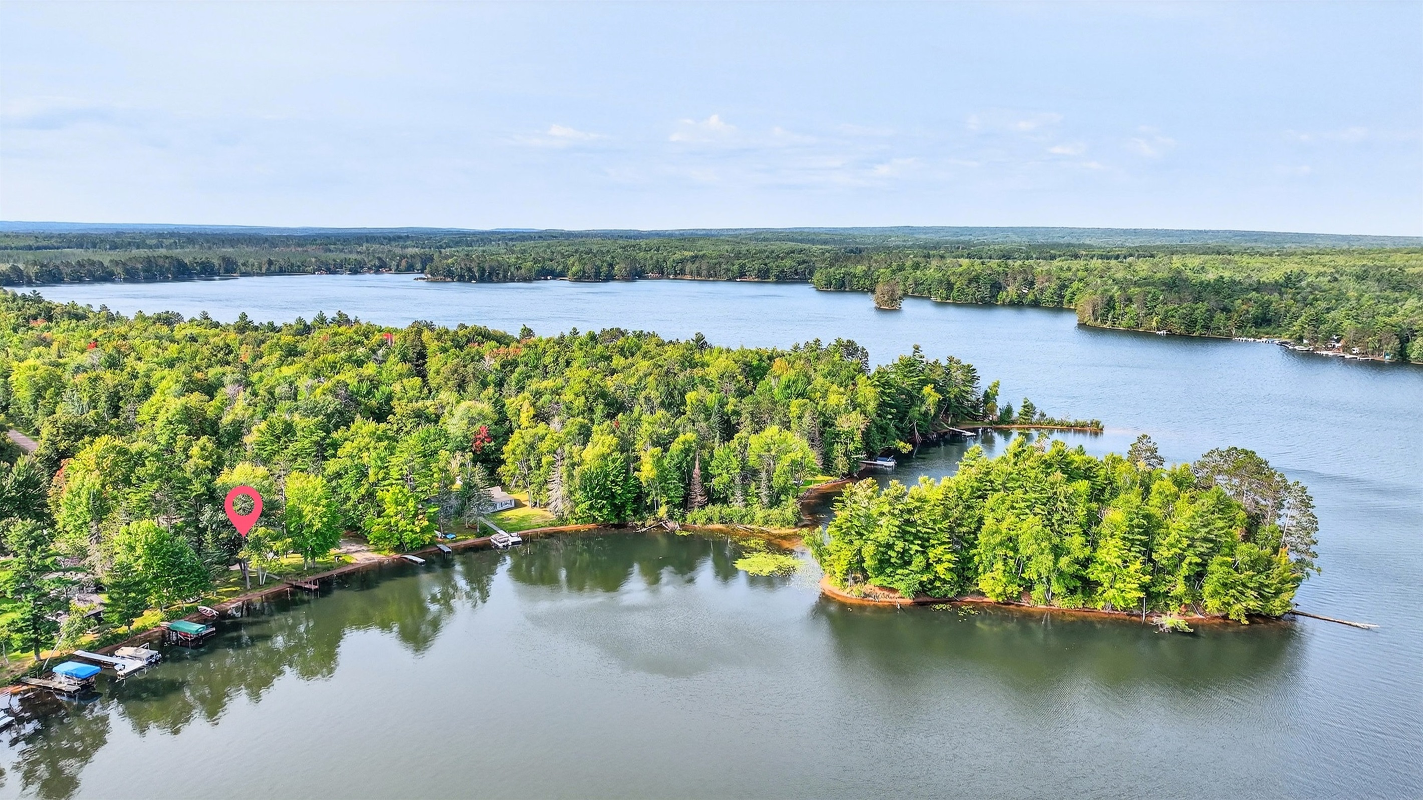 Blueberry Lake is 292 acres. The home's location on a smaller part of the lake and across from the island means we are often blocked from wind and waves and have calmer water for kayaking and swimming.
