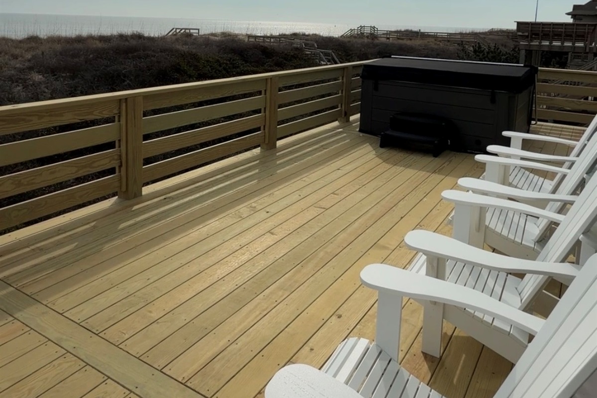 New deck with hot tub overlooking the ocean